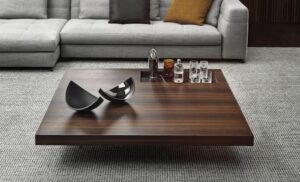 BOTECO coffee table by MARCIO KOGAN (studio mk27), designed in 2020. The clever juxtaposition of different materials and their combination, creating an elegantly harmonious look, are the result of the research done by the Brazilian design studio, supported by MinottiI‚Äôs know-how to manage joint projects.