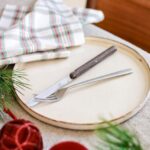 STEAK KNIFE by ANDR√âE PUTMAN.Designed by ANDR√âE PUTMAN and her daughter OLIVIA as part of the STUDIO PUTMAN, this series of knives for FORGE de LAGUIOLE reinterprets in an absolutely personal way and with brilliance, two identifying signs of an ancestral cutlery tradition, the straight handle and the Bourbonnaise blade with a centered point. Available in ebony or densified ash, this timeless knife has the simple yet refined elegance characteristic of the maker who also rediscovered the furniture of the 1930s by reissuing its greatest signatures. The knife has conquered the most demanding tables.