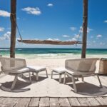 SEASHELL features backrests that look and feel like an open embrace and an airy weave as breathable as it is artful ‚Äì designer JEAN-MARIE MASSAUD