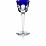 The HARCOURT 1841 RHINE wine glass showcases not only the characteristic architectural form of Baccarat‚Äôs famous HARCOURT 1841 collection, but also a play on light and color thanks to an overlay of bright crystal. The stunning flat-cut pattern of the bowl, which sits atop a tall lean stem, is crested with a translucent coat of splashy crystal. The graceful HARCOURT 1841 form is enhanced from every angle by the vivid hue, giving it depth and panache. The RHINE wine glass adds a modern and cheery flourish to the grand history of this storied collection.