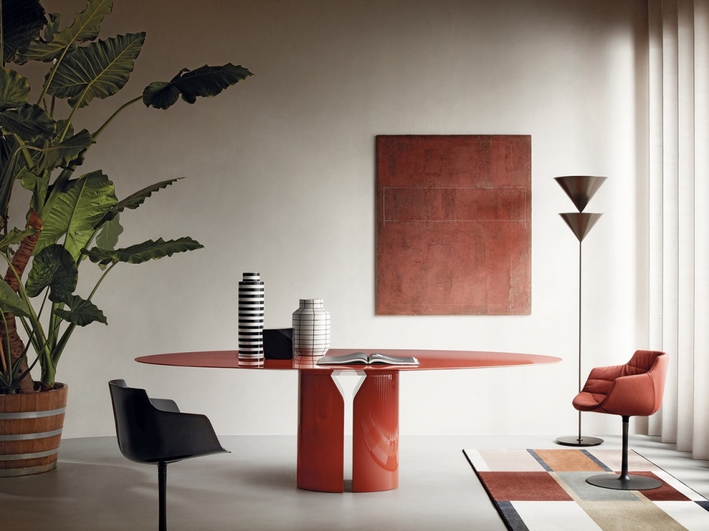 NVL TABLE by JEAN NOUVEL, designed in 2020. A mono-material table, with contemporary lines and characterized by a strong personality. It represents distinctive features of JEAN NOUVEL‚Äôs architecture ‚Äì pure geometric shapes, formal lightness, graphic lines, rigor.