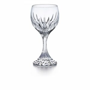 The MASSENA glass showcases Baccarat‚Äôs meticulous craftsmanship. Deep orgue bevel cuts are etched directly into the clear crystal, radiating from the foot of the glass to the base of the wide bowl. This, in turn, puts the smoothness of the upper bowl in sharp relief. The intricate detailing gives the MASSENA glass the appearance of impressive heft, as if it were a modern-day chalice. The polished silhouette and prismatic qualities make it worthy of any festive occasion or special soir√©e. The glass is just one component of the iconic MASSENA bar and tableware collection, which encompasses wine glasses, highball glasses, tumblers, and a decanter. All pieces from the MASSENA collection share a scrupulously textural quality.