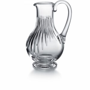Baccarat MASS√âNA pitcher. Deep orgue bevel cuts are etched directly into the clear crystal, irradiating along the ample rounded globe towards the base. Their intricacy, in turn, put the smoothness and lucidity of the upper bowl into sharp relief. The stunning silhouette and prismatic optical effects of the cuts make the MASSENA pitcher a great addition to any table, one that accents any festive occasion or special soir√©e with a luminous beauty and optical splendor. The pitcher is just one element of Baccarat‚Äôs iconic MASSENA bar and tableware collection, which encompasses wine glasses, highball glasses, and tumblers. All pieces from the MASSENA collection share scrupulously rendered orgue bevel cuts.