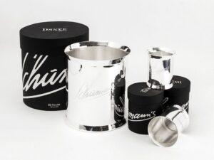 STAINLESS STEEL AND SILVER PLATED CHAMPAGNE BUCKET AND TUMBLER - DESIGNED BY CHARLES SCHUMANN