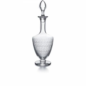 ROHAN decanter. The ROHAN collection is acid etched, giving the Baccarat crystal an elegant originality. The refined curves joined to a bevelled base make it a modern and delicate collection for the bar. The collection consists of a decanter, glasses, a champagne flute, a highball and a tumbler, and will delight liqueur and cocktail enthusiasts.