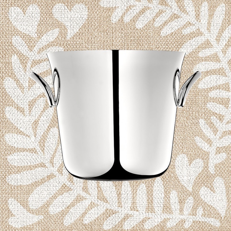 VERTIGO champagne bucket. The smaller silver plated and modern VERTIGO champagne bucket is a great gift for lovers of bubbles and people who like to entertain. Can also be used to chill white wine. VERTIGO‚Äôs bold motif - a subtly asymmetrical, thick ring often placed playfully askew - can be found on every piece in the collection designed by ANDR√âE PUTMAN. Price 720 ‚Ç¨
