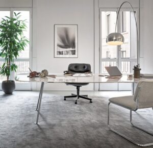 A home office for the aesthete. PIERO LISSONI'S GRASSHOPPER table, with its slender surface and organic form, adds a refined touch the elevated workspace.