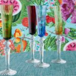 MILLE NUITS COLLECTION. A set of 4 flutes in red, green, blue and yellow.