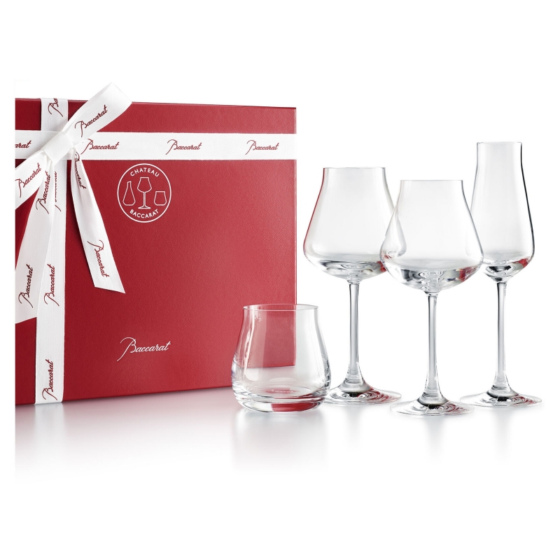 CH√ÇTEAU Baccarat degustation set. Developed in collaboration with BRUNO QUENIOUX, a renowned wine expert, the CH√ÇTEAU Baccarat set of oenological glasses is revolutionizing wine tasting. The rounded and curved cup of the glass preserves the harmonization of aromas and the condensation of alcohol content: subtlety wins the day over potency and sublimates the act of tasting. Presented in the emblematic red coffret, this box of 4 glasses accompanies all those truly exceptional moments. A champagne flute to add sparkle, two wine glasses and to enhance every grand vintage, and a tumbler to unveil the very essence of spirits.