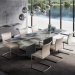 DINING TABLE ATLAS - DESIGNER GEORG AAPELTSHAUSER 2014,CHAIR NOBILE SWING - DESIGNER GINO CAROLLO 2015.