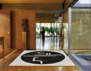 ST. TROPEZ rug by EILEEN GRAY, designed in 1926 - 1935.EILEEN GRAY not only created some of the most important 20th century furniture classics but also had her own studio where rugs were produced according to her designs. Some of her most beautiful patterns are now again available: masterpieces of abstract textile art of 100 % pure new wool, natural vegetable dye, hand-woven and processed to the highest quality with a density of 80 knots per square inch. ST. TROPEZ is dedicated to the peninsula that EILEEN GRAY held particularly dear and which she was one of the first people to discover.