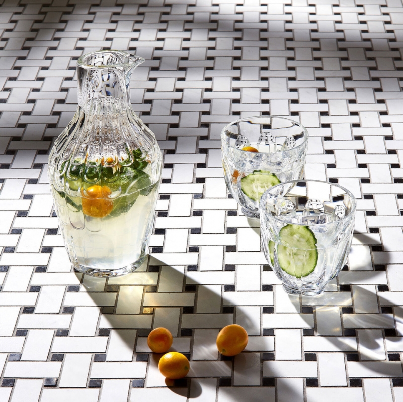 FAUNACRYSTOPOLIS HARCOURT pitcher. The perfect balance between heritage and fantasy! With the FAUNACRYSTOPOLIS pitcher, designer JAIME HAYON  revisits with humor and poetry the codes of the iconic HARCOURT glass.  It reinvents itself over the years. HARCOURT, the star of glasses, inspires the greatest designers. Reinterpreted by JAIME HAYON, Harcourt is transformed into a pitcher with a bird's head. With its pointed beak, its diamond-cut eyes and its feathers inspired by the facets of the famous glass, the FAUNACRYSTOPOLIS pitcher transports us into the fantastical universe of the Spanish designer. A must-have to surprise your guests!