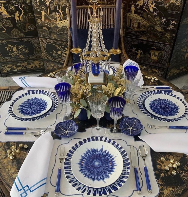 Beautiful table set by JUAN CARLOS BEK with the IN BLOOM collection designed by ZEMER PELED.The IN BLOOM collection by  ZEMER PELED is the result of an encounter between a talented young artist and exceptional craftsmanship. During her residency at the Manufacture Bernardaud, ZEMER PELED  spent time observing and understanding the complexity of creating a porcelain piece. It is with great enthusiasm that she became interested in the know how of decoration, alongside an expert who has been working at Bernardaud for more than 30 years. She learned to perform a quick, precise gesture and to perfectly control the pressure of her brush to achieve the desired effect: a decor where you feel the gesture and texture.