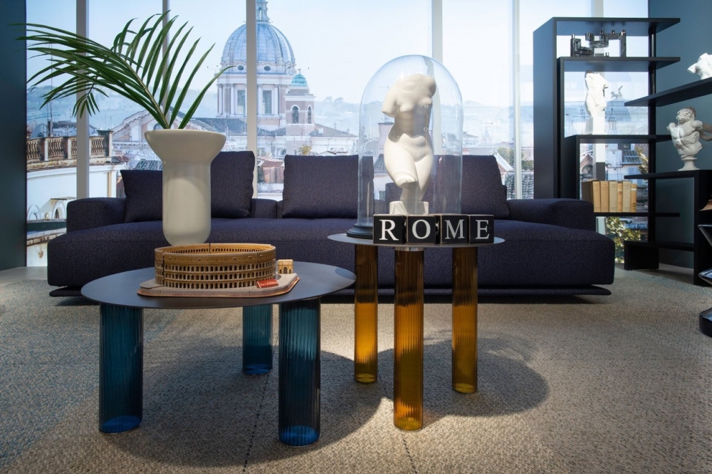 SMALL TABLE ECHINO BY SEBASTIAN HERKNER 2019, SMALL TABLES ARE THREE-LAYERED BLOWN GLASS LEGS IN THE SHADES SMOKY GREY, LIGHT- BLUE, AMBER OR BLUE. STEEL SHEET TOP, 4 MM THICK, WITH EITHER NATURAL OR BLACK NICKEL-SATIN FINISH OR MIRROR TOP, 5 MM THICK.