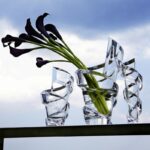 SPIRALE vase. Like a ribbon fluttering in the wind, the SPIRALE vase designed by THOMAS BASTIDE enhances the magic of crystal with its enchanting swirl.