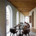 EGEO TABLE BY JACOPO FOGGINI FOR EDRA BLUE VELVET AND VERMELHA CHAIRS BY ESTUDIO CAMPANA.A PERFECT PAIR BETWEEN BLUE VELVET CHAIRS AND EGEO TABLE AT LA FORNACE SUITE IN FLORENCE. DIFFERENT MATERIALS COMBINED TO OFFER COMFORT AND NEW POINTS OF VIEW