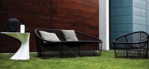 An important position in the outdoor collection is held by the CLUB sofa and small armchair designed by PROSPERO RASULO 2008. Their internal structure is in painted steel (suitable for outdoor use) and woven pvc rod with reinforced nylon.
