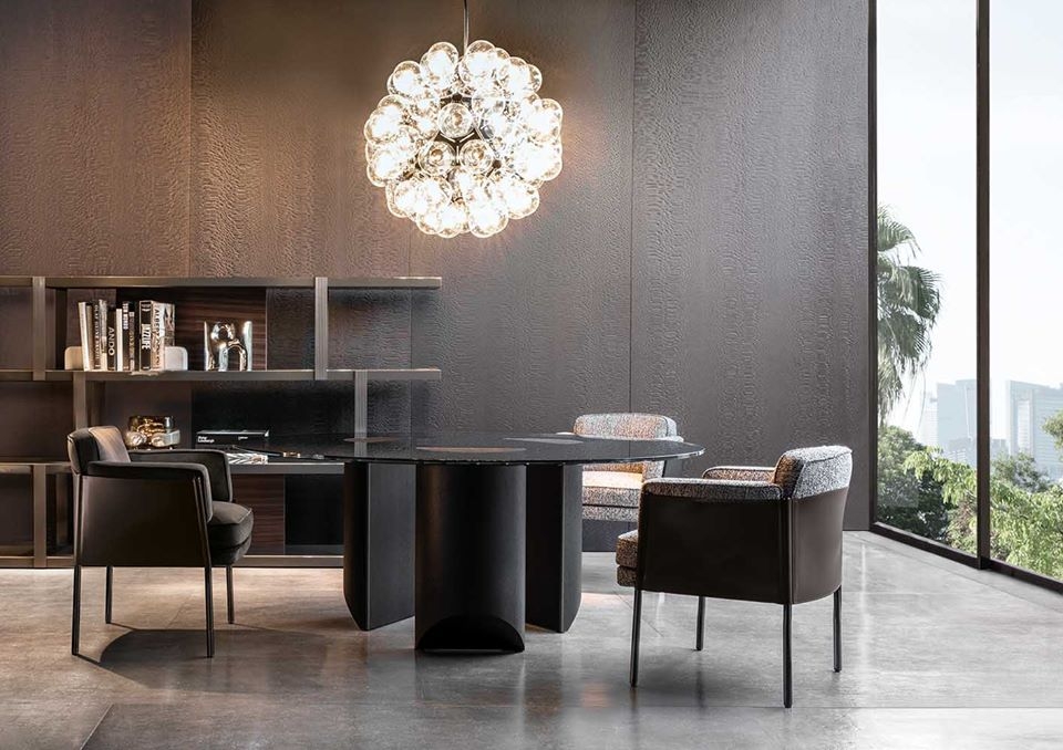 SHELLEY DINING ARMCHAIR BY GAMFRATESI easily combines compact proportions with a contemporary aesthetic taste.