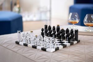 Take the time for the game of kings. CHESS GAME designed by MARCEL WANDERS STUDIO for Baccarat, the king of games and the game of kings is transformed into a genuine collector's item. Pawns in crystal and chessboard in inlaid marble.