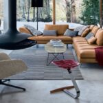 SOFA BRUCE BY LUDOVICA + ROBERTO PALOMBA 2013.POLISHED ALUMINUM ALLOY, OR WITH NATURAL OR BLACK NICKEL-SATIN FINISH, OR BLACK PAINTED. STEEL FRAME. ELASTIC STRIPS SUSPENSION. UPHOLSTERY IN GRADUATED POLYURETHANE/ DACRON DU PONT. SEAT CUSHION IN POLYURETHANE/DACRONDU PONT. BACK AND ARMREST CUSHIONS IN GOOSE FEATHER. UPHOLSTERY OF ROLL-SHAPED CUSHION IN POLYURETHANE/ HEAT-BOUND POLYESTER FIBRE. REMOVABLE COVER IN FABRIC OR LEATHER.