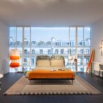 BED FLORIN BY ROBERTO LAZZERONI 2018.HEADBOARD FRAME AND FEET VENEERED IN OPEN PORE PAINTED ASH IN THE SHADES ASH-GREY, MUSTARD OR NAVY BLUE. UPHOLSTERY IN POLYURETHANE/HEAT-BOUND POLYESTER FIBRE. EXTERNAL REMOVABLE FABRIC OR LEATHER COVER. THE BASE HAS A STEEL FRAME WITH NATURAL BENT BEECH STRIPS (6,8 CM WIDE). THE MODEL WITH SEPARATE SPRINGING AND WITH DECORATIVE FABRIC HENRI (MISIA-CASAMANCE GROUP) IN TWO COMBINATIONS ARE AVAILABLE: HENRI BLU DI PRUSSIA ‚Äì QUADRIFOGLIO 27013 (1); HENRI AMETISTA ‚Äì QUADRIFOGLIO 27057 (2). UPON REQUEST: BED SIZE FOR 210 CM LONG MATTRESS AND SPRINGING WITH STRIPS 3,8 CM. WIDE.