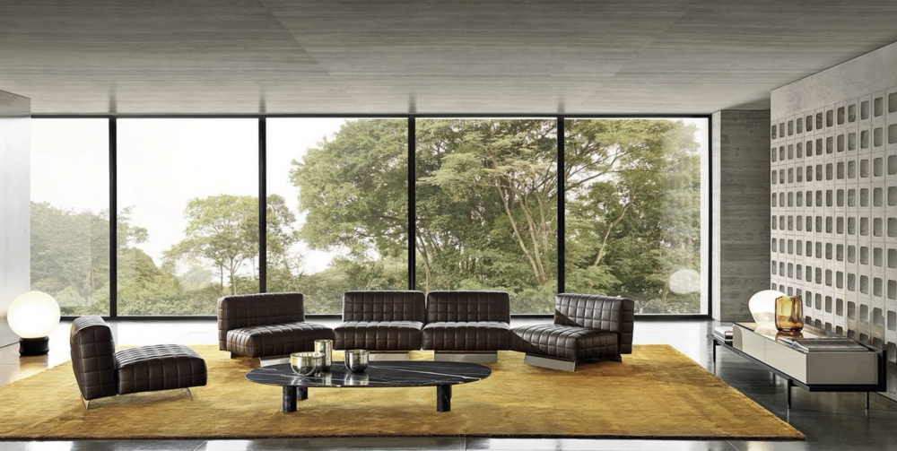 TWIGGY modular seating system by RODOLFO DORDONI , designed 2022.A new aggregative language is born: free from schemes and preconfigurations, capable of adapting to needs in continuous evolution. The Twiggy seating elements have rigorous geometric shapes but are extremely comfortable and enveloping, covered in leather, nubuck or fabric and embellished with refined stitching.