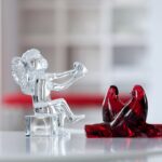 ANGE CHERUB designed by JEAN-PIERRE GODON. Gracefully seated with criss-crossed legs and extended arms, this wholesome cherub willingly offers his heart to the person he adores. The cherub‚Äôs face is titled upwards, cementing the connection between himself and his loved one with this declarative gesture. Designed by JEAN-PIERRE GODON for Baccarat, this little cupid is a wonderfully tender-hearted emblem of devotion. Be it to celebrate Valentine‚Äôs Day or honor an anniversary, this angel figurine is suitable for any sentimental occasion that warrants a beautiful token of affection for your beloved.