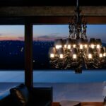 Crystal chandelier 24 lights Z√âNITH NOIR - designer PHILIPPE STARCK. Available in 2 sizes and the number of lights ranges  from 6 to 24.