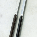 ANDR√âE PUTMAN ebony table knives, set of 2.Before bringing her distinctly feminine and pure touch to a collection of FORGE DE LAGUIOLE¬Æ knives, ANDR√âE PUTMAN pursued a career as a pianist, like her mother, who was a concert performer. Her free-spirit is omnipresent in her work. She founded her own company, Ecart, in 1978 specializing in the decoration and re-editing furniture of the 1930s. Her designs are both strong and straight-forward. FORGE DE LAGUIOLE¬Æ ASKED her to create a