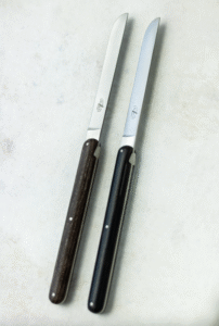 ANDR√âE PUTMAN ebony table knives, set of 2.Before bringing her distinctly feminine and pure touch to a collection of FORGE DE LAGUIOLE¬Æ knives, ANDR√âE PUTMAN pursued a career as a pianist, like her mother, who was a concert performer. Her free-spirit is omnipresent in her work. She founded her own company, Ecart, in 1978 specializing in the decoration and re-editing furniture of the 1930s. Her designs are both strong and straight-forward. FORGE DE LAGUIOLE¬Æ ASKED her to create a