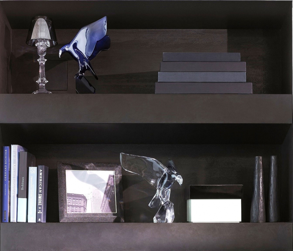 IMPERATOR EAGLE. JAN T√âSAR designed this remarkable figurine for Baccarat, honoring the revered bird of prey in all its stunning form. Perched on a rock, the eagle‚Äôs stance is commanding: its mighty wings wide open, beak pointed, gaze fixed on some unknown target. The Imperator eagle is crafted using a complicated process that involves a plaster mold, a clay mold, special ovens, and meticulous craftsmanship. The resulting contours are smooth and polished. The Imperator eagle is available in two sizes, as well as in the American eagle design, which has more detailing that yields a dappled effect in the light. The eagle figurine is perfect gift for at all animal lovers and people with a powerful presence.