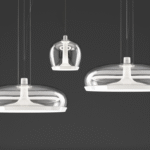 AURELIA pendant lamp designed by PATRICK JOUIN. Aurelia is an elegant object made of spun metal and hand-blown glass. Dual, user replaceable LED light sources (available in 2700K and 3000K) can be controlled independently, creating soft direct light and surprisingly unexpected reflections of indirect light. Smart disassembly system to remove the glass diffuser for quick and easy cleaning.