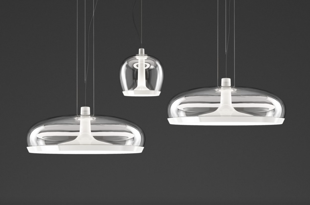 AURELIA pendant lamp designed by PATRICK JOUIN. Aurelia is an elegant object made of spun metal and hand-blown glass. Dual, user replaceable LED light sources (available in 2700K and 3000K) can be controlled independently, creating soft direct light and surprisingly unexpected reflections of indirect light. Smart disassembly system to remove the glass diffuser for quick and easy cleaning.