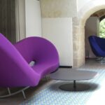 VICTORIA AND ALBERT SOFA BY RON ARAD AND FJORD STOOL BY PATRICIA URQUIOLA - BIBA SHOW DINNER IN TARANTO, ITALY, 2006.  INTERIORS: MICHELE GAUDIOMONTE STUDIO MIGRA PROJECT