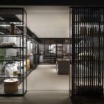 STORAGE WORDROBE SYSTEM by PIERO LISSONI + CRS PORRO.As the epitome of PORRO‚Äôs customisation abilities, Storage experiments with an unprecedented freedom of combination. The finishes of the frame and metal parts, until now strictly tone-on-tone, are mixed: extra-light white ash surfaces are juxtaposed with dark metal elements with unpredictable results, without fear of daring and lighting up the atmosphere with an interplay of surprising contrasts.