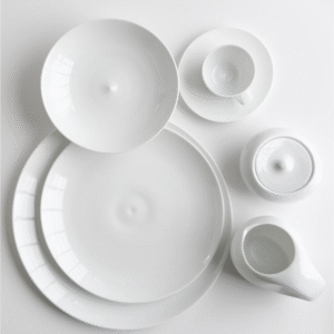 Porcelain tableware BULLE. The shape of Bulle expands the range of choices for the White Table. The motif recalls ripples on the surface of water and the collection offers several new pieces whose use is dictated by the elegance of fine dining.