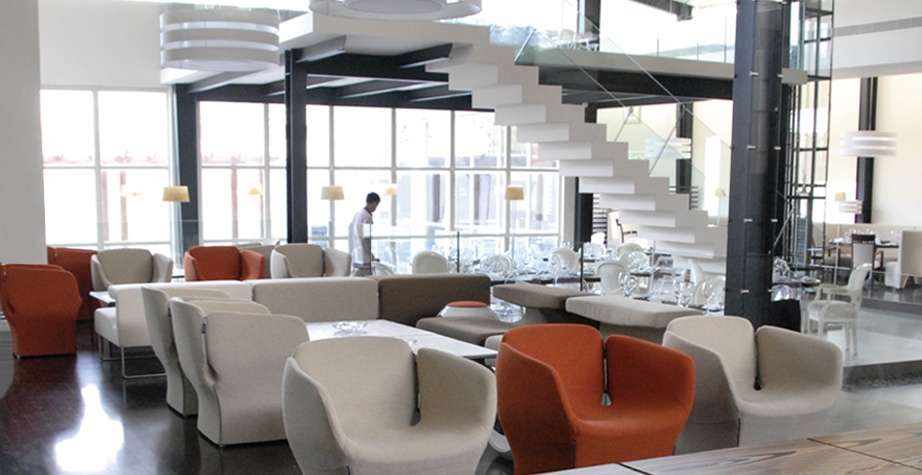 BLOOMY SMALL ARMCHAIR AND LOWSEAT SYSTEM BY PATRICIA URQUIOLA - CAF√à ITALIA MANAMA, BARHEIN, 2010