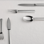 CHANTACO cutlery collection ‚Äì 20 pieces. This silver-plated metal flatware stands out for a design that blends strength and simplicity. The straight handle, embellished with fluting patterns along its full length, creates a beautiful contrast of light and shadow.