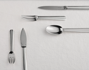 CHANTACO cutlery collection ‚Äì 20 pieces. This silver-plated metal flatware stands out for a design that blends strength and simplicity. The straight handle, embellished with fluting patterns along its full length, creates a beautiful contrast of light and shadow.