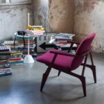 ARMCHAIR LOUISE BY PHILIPPE NIGRO 2018.THE HARMONY OF SOLIDS AND VOIDS IN THE ALTERNATION BETWEEN SIMPLE WOODEN ELEMENTS AND THE FABRIC OR LEATHER COVER:   LOUISE IS AN ETHEREAL STRUCTURE, WHERE YOU CAN SIT AND LET YOURSELF BE INSPIRED BY INTERESTING AND CREATIVE READINGS.  LOUISE WAS BORN IN 2018 FROM PHILIPPE NIGRO'S RESEARCH ON STRUCTURE, MINIMALISM AND COMFORT.