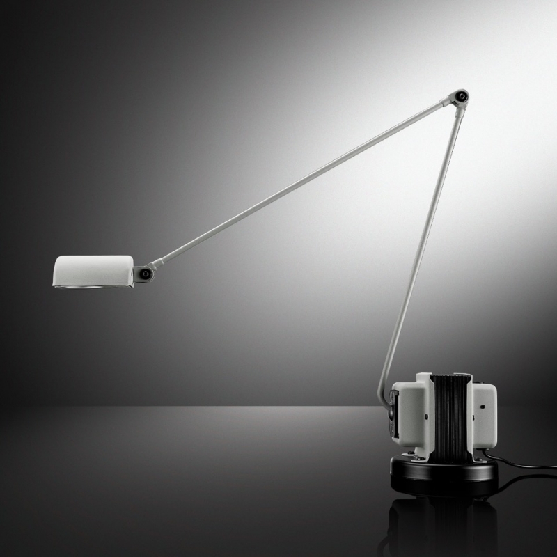 DAPHINE table lamp by TOMMASO CIMINI 1975. Since 1975 this lamp has represented the essence of Lumina. It is displayed in some of the most famous Museums of Modern Art and Design in the World.  DAPHINE is a timeless synthesis of function and form: an articulated arm, with a pivoting diffuser, mounted on a transformer. Available now with LED version, identical to the CLASSIC DAPHINE in shape and in movement, but with a more powerful light against lower consumptions. Table standing lamp in metal an articulated arm and diffuser pivoting on 360¬∞. The base of cast iron comes black varnished. Available with LED light source. Two step switch and dimmer.  This true icon of design has earned its place in the world‚Äôs major design and contemporary art museums, including the Brooklyn Museum and Judd Foundation in New York, the Mus√©e des Arts D√©coratifs in Paris, Die Neue Sammlung in Munich and The Israel Museum in Jerusalem.