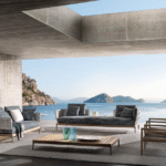 PATIO TEAK outdoor seating system by GAMFRATESI , designed 2022.The outdoor seating system designed by Italian-Danish duo GAMFRATESI is a compositional mosaic. The juxtaposition of the individual elements creates a style that is decisive and strongly characteristic, yet delicate and light thanks to its suspended, aerial feet.