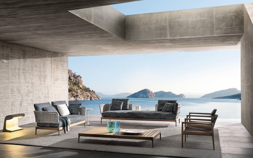 PATIO TEAK outdoor seating system by GAMFRATESI , designed 2022.The outdoor seating system designed by Italian-Danish duo GAMFRATESI is a compositional mosaic. The juxtaposition of the individual elements creates a style that is decisive and strongly characteristic, yet delicate and light thanks to its suspended, aerial feet.