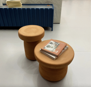 TOTOT√í coffee table designed by PAOLO CAPPELLO and SIMONE SABATTI. TOTOT√í is a low table packed with substance: 100% high-temperature terracotta to achieve its distinctive earthy colour. Only the hands of its artisan succeed in giving it the iconic full and soft shape of its design, offering your living space a new concept of fluidity.