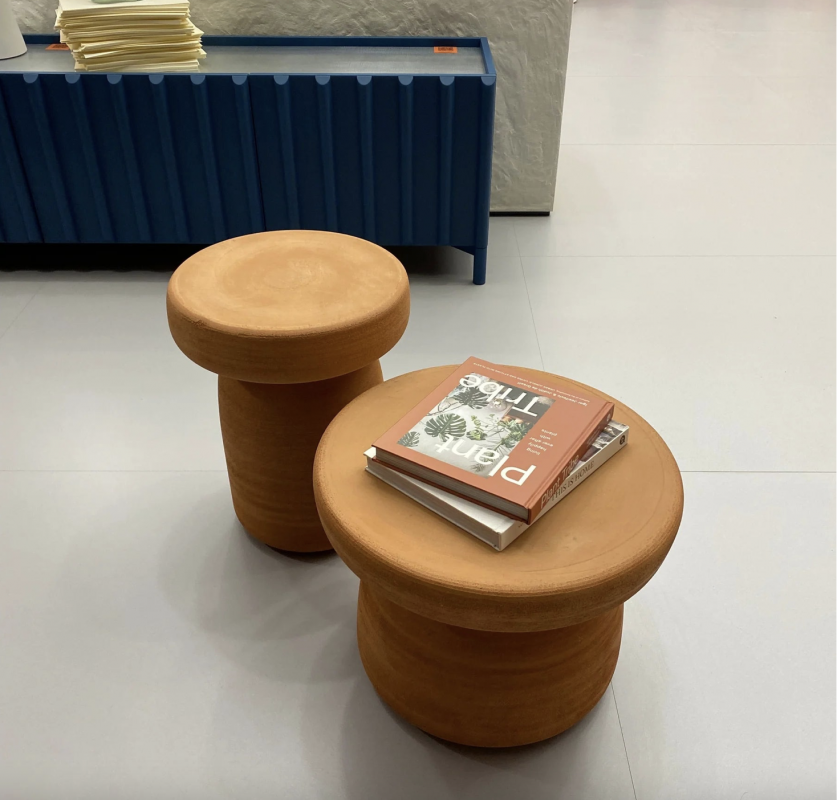 TOTOT√í coffee table designed by PAOLO CAPPELLO and SIMONE SABATTI. TOTOT√í is a low table packed with substance: 100% high-temperature terracotta to achieve its distinctive earthy colour. Only the hands of its artisan succeed in giving it the iconic full and soft shape of its design, offering your living space a new concept of fluidity.