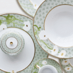 PRAIANA collection.PRAIANA draws its inspiration from the Art Nouveau style; multiform and international, this movement is that of curves and arabesques. Freely inspired by nature, also privileging the theme of woman, it is a pure product of the Belle Epoque. The very enveloping decor on each piece reminds us of the precious objects dressed in green shark-skin that were very fashionable in the 1920.