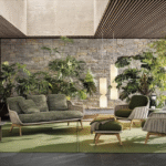 BELT CORD OUTDOOR by RODOLFO DORDONI, designed in 2022.The BELT CORD OUTDOOR family is composed of a two-seater sofa, bergere, armchair, ottoman, lounge and dining armchairs, all also available with natural finish teak legs. With a more classic feel and a warmer aesthetic, this version can be easily combined with all the other furnishing pieces in the outdoor collection.