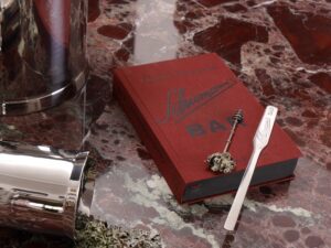 STAINLESS STEEL COCTAIL STIRR AND BOOK AMERICAN BAR - DESIGNED BY CHARLES SCHUMANN