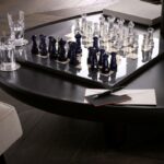 CHESS GAME.The chessboard is made in rare and exotic woods in colours.
