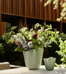 FAZZOLETTO vase-sculpture by FULVIO BIANCONI and PAOLO VENINI in 1948. The ‚ÄúFAZZOLETTO‚Äù was born from the collaboration between FULVIO BIANCONI and PAOLA VENINI with a soft shape and a wavy and moved hem, always unique, obtained with the flying hand technique.The vase-sculpture, which has become a timeless icon and entered the permanent collection of the MoMA in New York, is made from blown glass by what is known as the ‚Äúflying hand‚Äù technique.The term‚ÄØfree-hand‚ÄØ(in Italian, ‚Äúmano volante‚Äù, literally ‚Äòflying hand‚Äô) indicates the swift and expert movement of the master glassmaker‚Äôs hand as he hot works a precious piece of glass.